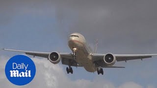 Incredible footage shows plane HOVERING in crosswind  Daily Mail [upl. by Nnayrb330]