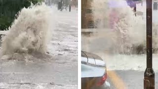 London flash floods Manhole explodes with water during heavy rain [upl. by Ierna]