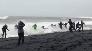 Waves Sneak Up Reynisfjara Beach in Iceland and Knock Over Tourists [upl. by Eugatnom717]